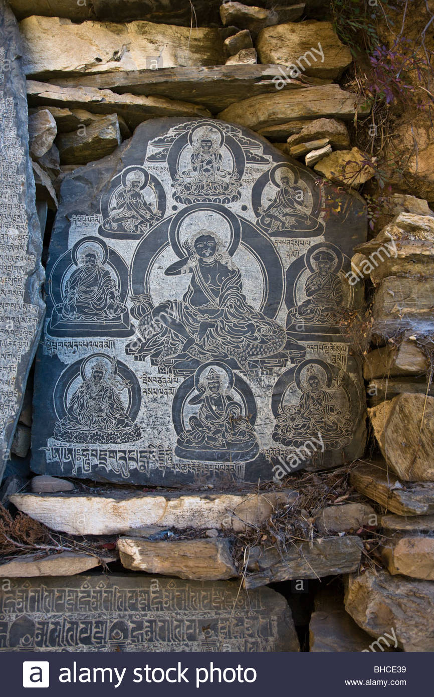a-tibetan-buddhist-mani-stone-is-carved-with-the-yogi-milarepa-in-BHCE39.jpg